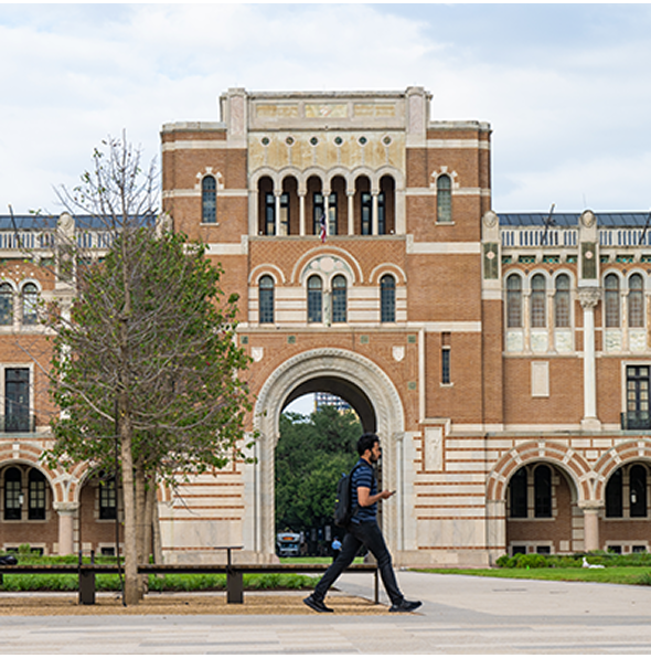 Student walking in front of Sallyport